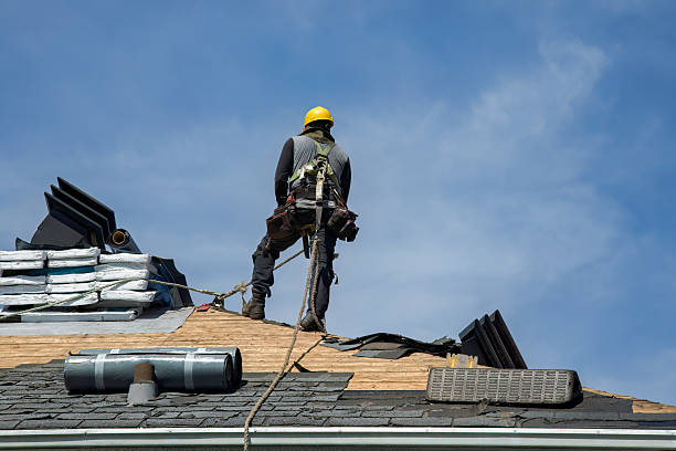 Professional Storm Damage Roof Repair technician working in Fulton, NY